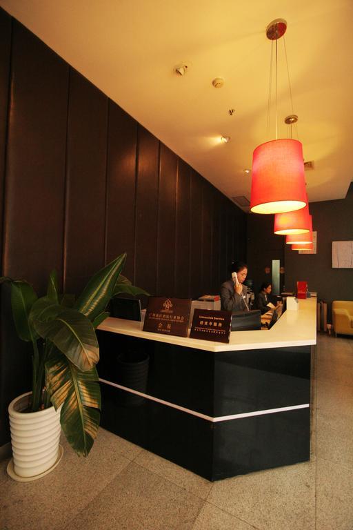 Yi-Wu Commatel Hotel Гуанчжоу Екстер'єр фото