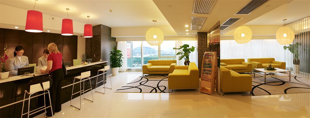 Yi-Wu Commatel Hotel Гуанчжоу Екстер'єр фото