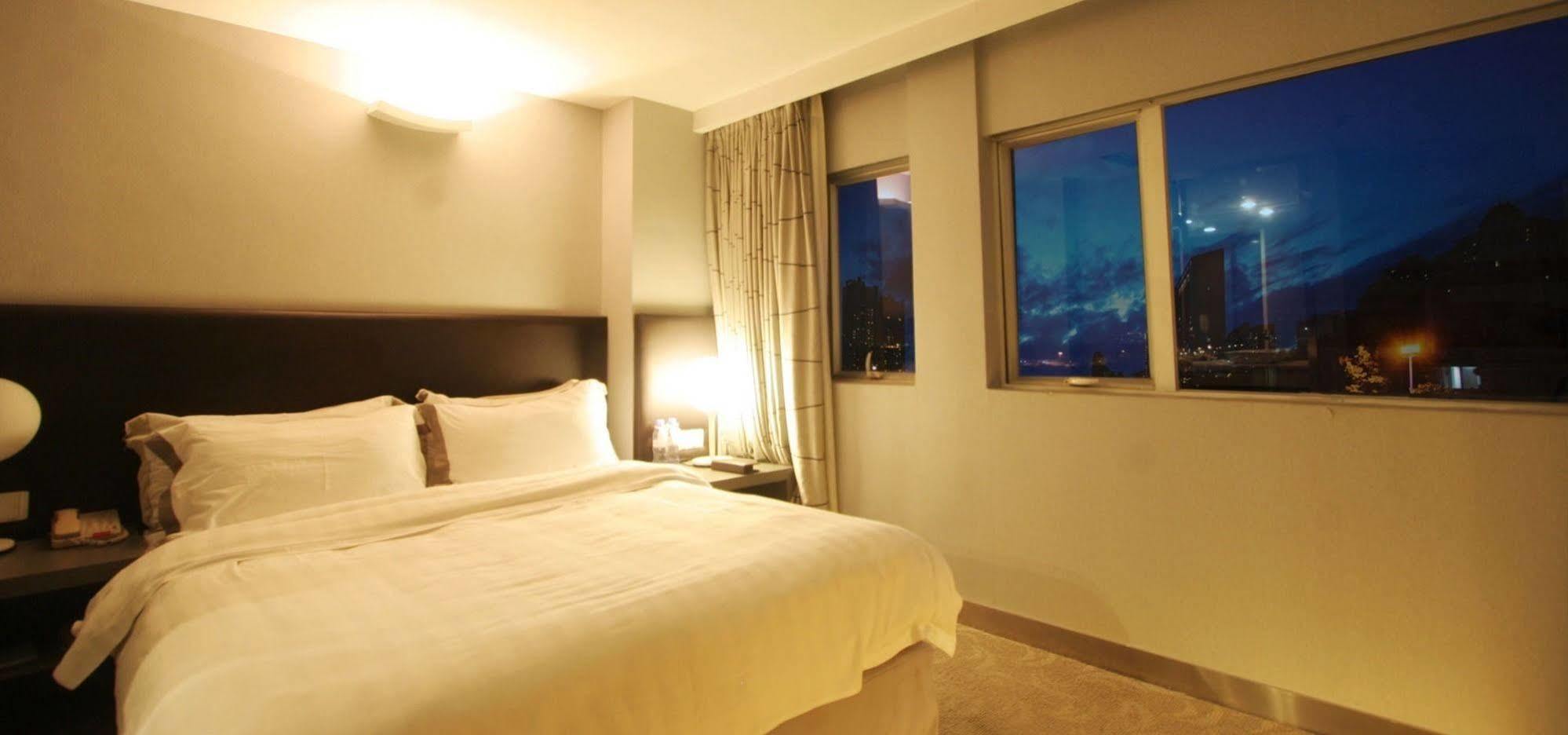 Yi-Wu Commatel Hotel Гуанчжоу Екстер'єр фото